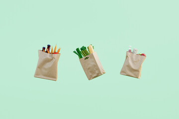 Shopping: Paper bags full of groceries floating on green background
