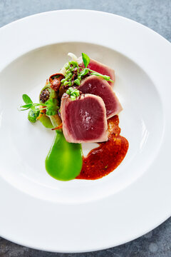 Tuna steak with fiddlehead fern