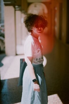 A woman in a city on holiday