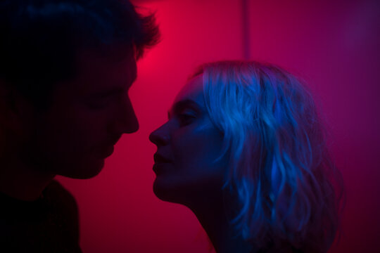 Dreamy portrait of night club romance