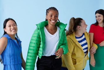 Group Of Diverse Models walking Together
