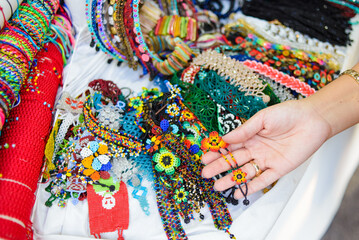 Accessories made with multicolored chaquira. Mexican handicrafts made with colorful stones.