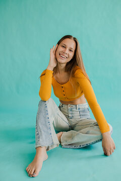 A vivid portrait of a bright cheerful young woman