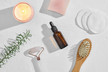 Face roller, natural soap and cosmetic oil or serum