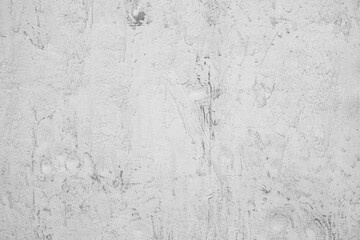 Gray concrete wall. The texture of the old plaster wall is interesting. Design background.