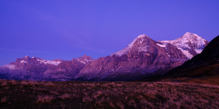 Wetterhorn, Schreckhorn, Eiger and M&ouml;nch mountain peaks at dusk