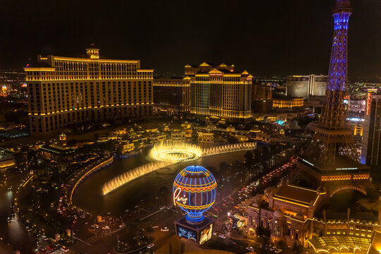Night view of the Eiffel Tower and Bellagio fountains,  Las Vegas.