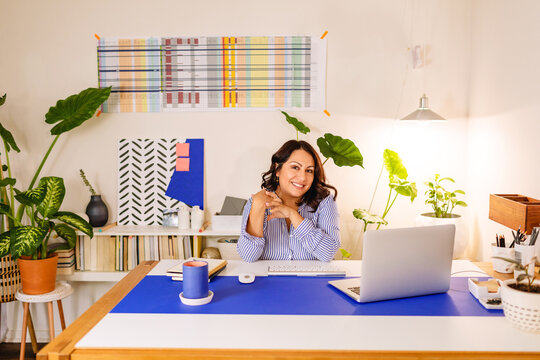 Pubicist woman working from cool office