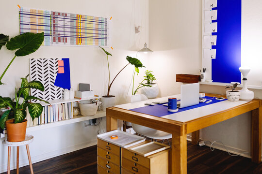 Office with wall spreadsheet calendar