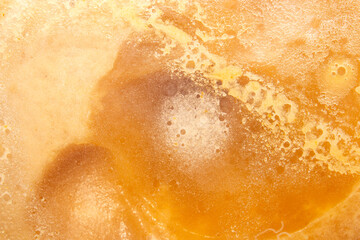 Natural bee honey based on propolis.Honey with propolis top view.The texture of honey.Background med.