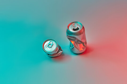 Crumpled blank cans on colorful neon background.