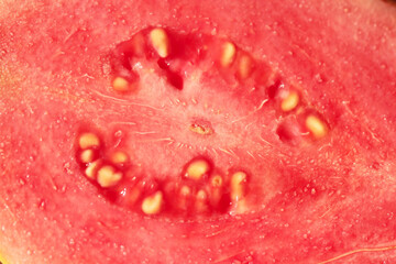 close up of red guava slices