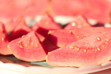 close up of red guava slices