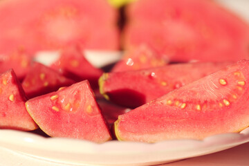 close up of red guava slices