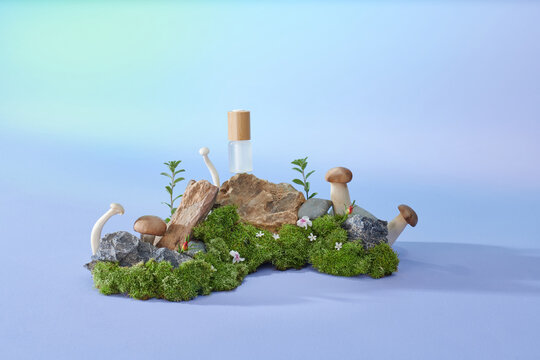 Cosmetic glass serum bottle in a stones and moss