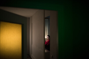 Woman looking at camera in minimal home