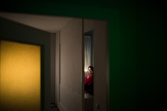 Woman looking at camera in minimal home