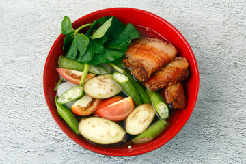 Freshly cooked Filipino food called Sinigang na crispy liempo