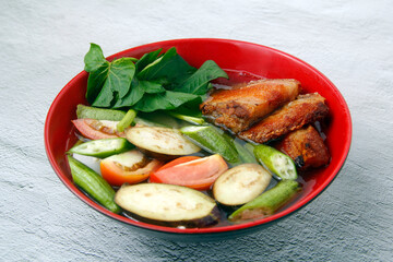 Freshly cooked Filipino food called Sinigang na crispy liempo