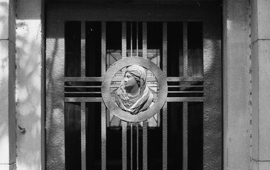 nterior of a tomb in a cemetery with religious imagery 