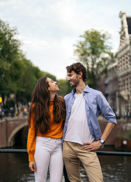 Portrait of a smiling young couple in Amsterdam