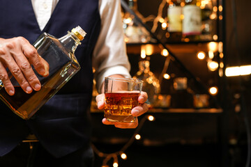 Bartender pouring Whiskey, on  bar,