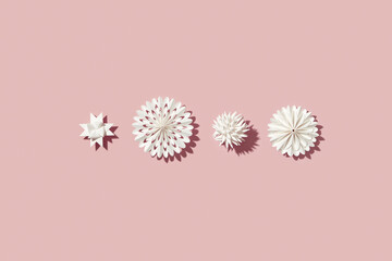 Simple papercraft stars and snowflakes .
