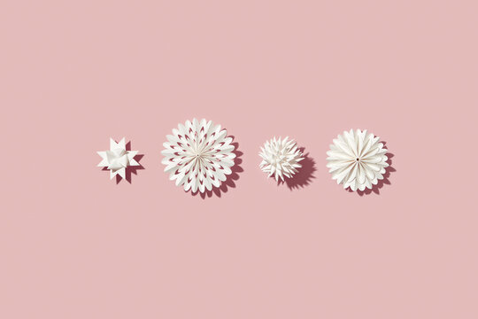 Simple papercraft stars and snowflakes .