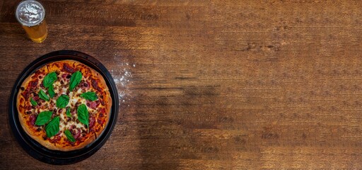 Pizza and Beer on large table