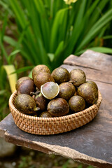 Matoa (Pometia pinnata) is a fruit plant typical of Papua. Has sweet taste, thick flesh like longan and has a durian smell. Also known as island lychee, tava, Pacific lychee. Served on basket