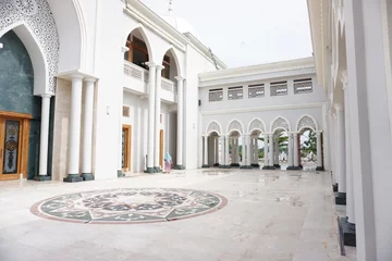 Gordijnen Beautiful white interior and architecture of quba mosque in madiun city.  Islam background concept. Muslim worship place.  © Hai.. Zainul