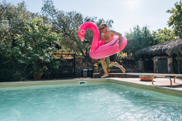 Jumping into the water at the pool