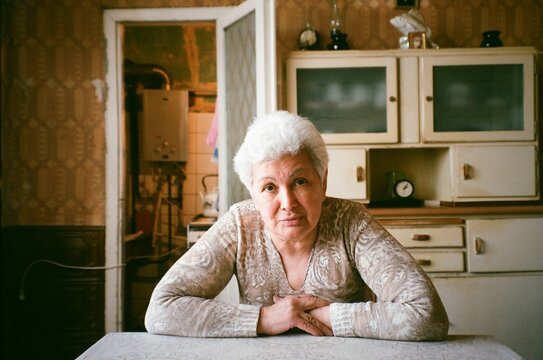 Portrait of senior woman in a kitchen