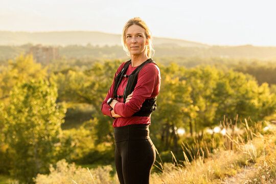 Trail Runner Rests And Takes In View