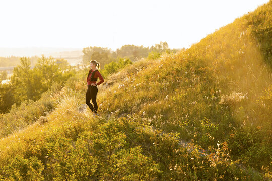 Trail Runner Rests And Takes In View