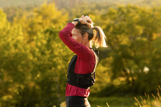 Trail Runner Rests And Fixes Hair