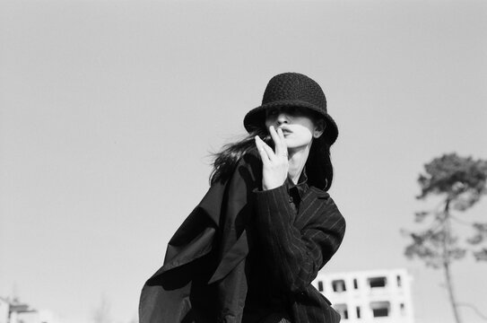 Woman in black hat outdoor