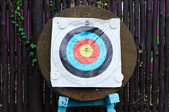 Archery target full of holes