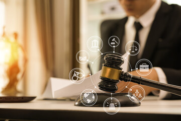 judge on wooden table And experienced lawyers meet with clients and give advice behind the scenes. legal services legal consulting concept