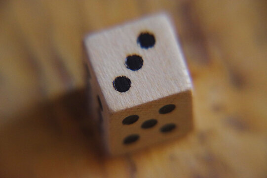 Close-up of a dice. Randomness concept