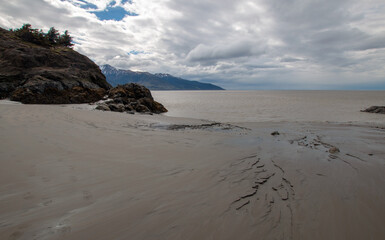 Mud beach at Beluga Point whale watching site on the Seward Highway near Anchorage Alaska United States