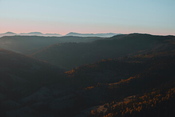 Beautiful mountains view in the morning. Autumn foggy landscape