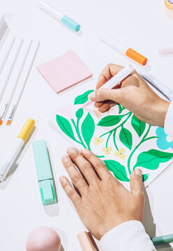 Artist drawing with marker