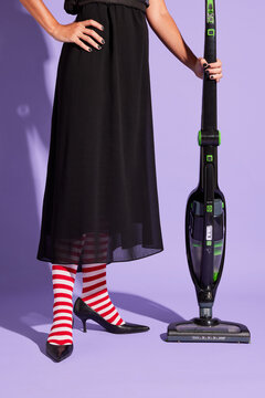Witch with vacuum cleaner