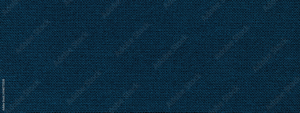 Wall mural texture of navy blue color background from textile material with wicker pattern. structure of vintag