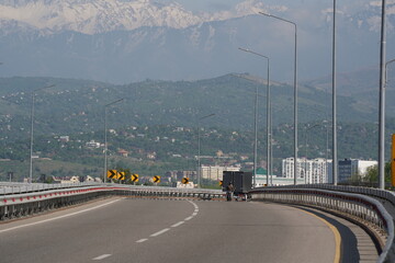 Fototapeta na wymiar Almaty, Kazakhstan - 04.26.2022 : Traffic flow at the new road interchange.