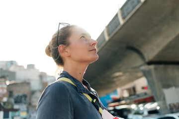 young woman looking in the sky