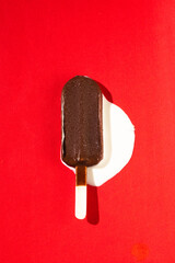 Delicious choco-bar on red background 