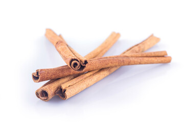 cinnamon on white background front view close up.