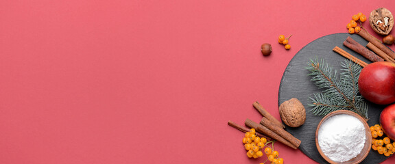 Ingredients for Christmas pie on red background with space for text